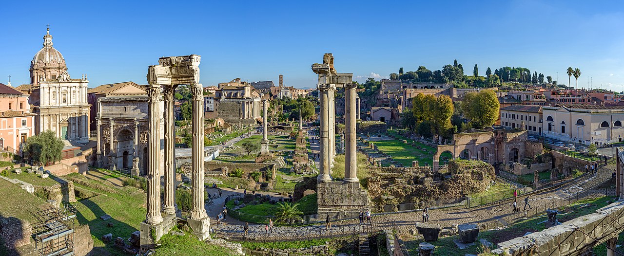 Roman Forum ruins in layered golden stone