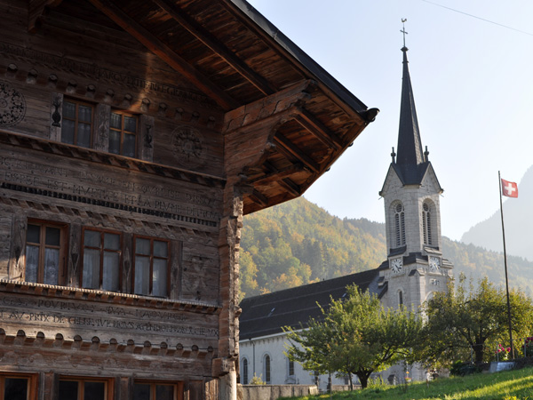 St. Grat Church Montbovon with traditional Swiss village architecture